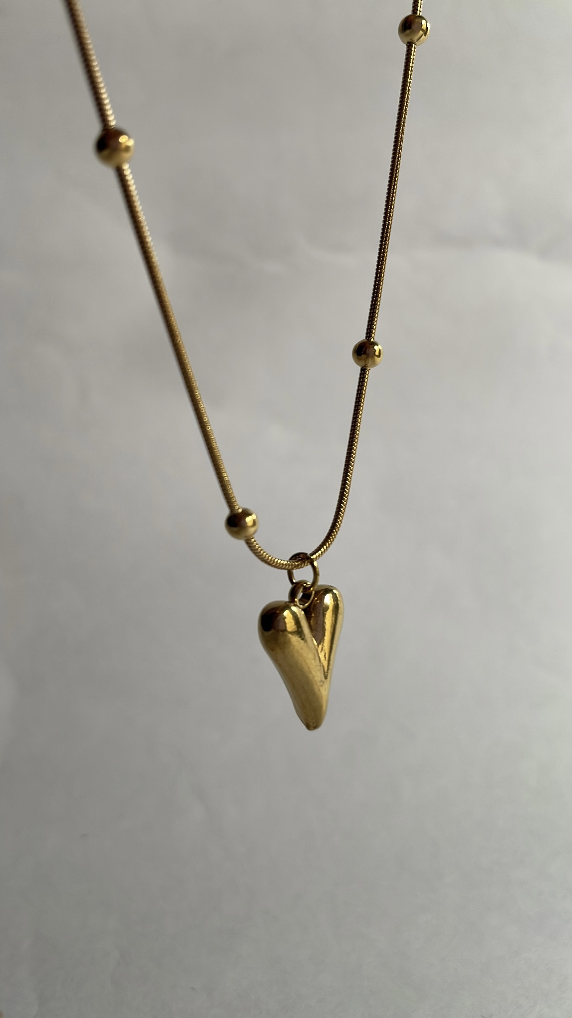 2D9ABE71-A2CA-4ABB-B8CD-46CE241F15C4 Dorica gold heart necklace - Image 1