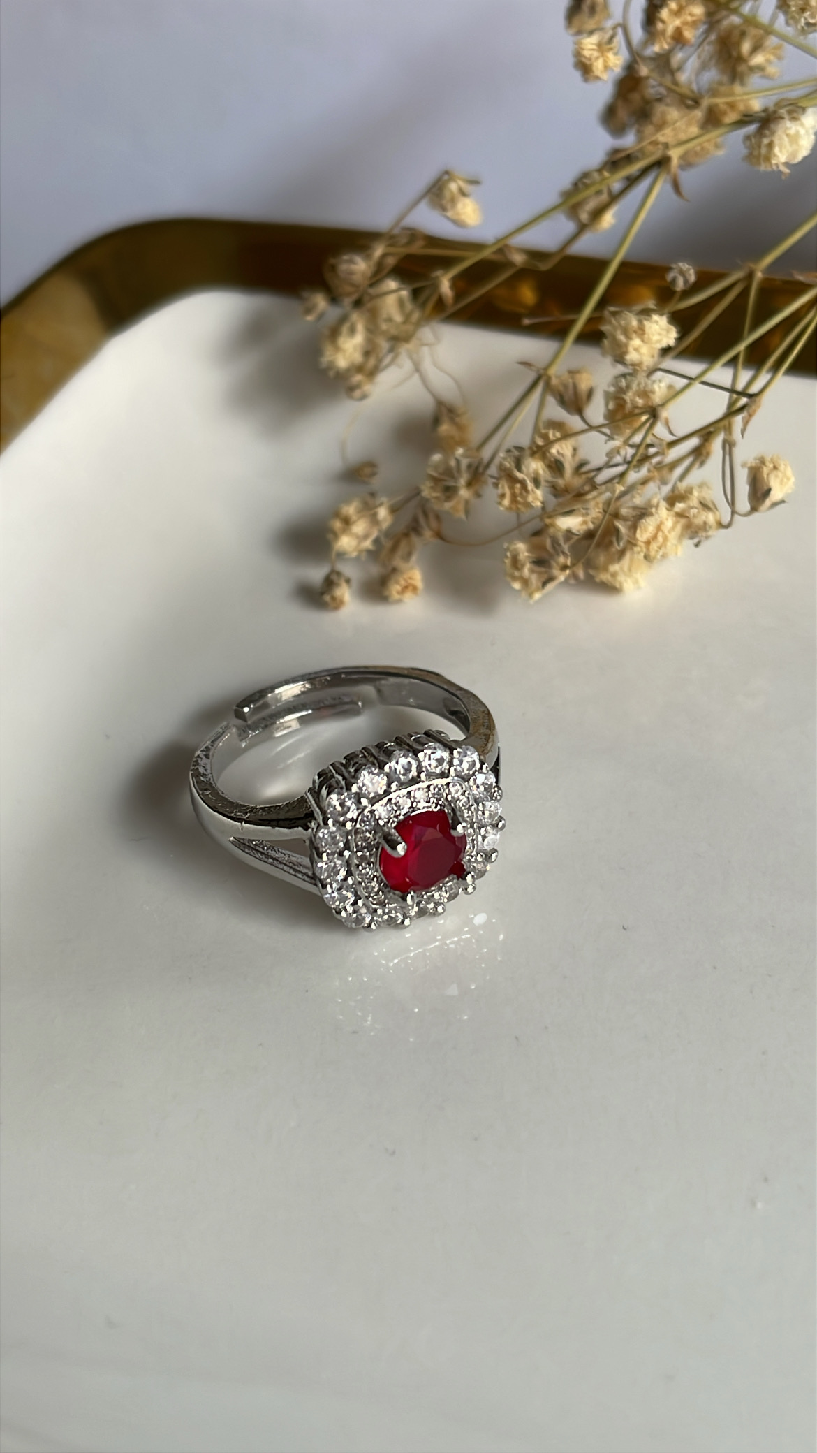 5C47C4D1-A594-4F4A-A91F-45A09706552F Ruby dangle ring (Adjustable Size) - Image 1